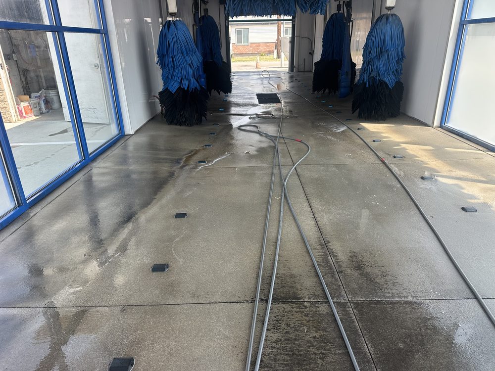 Car wash tunnel interior after cleaning